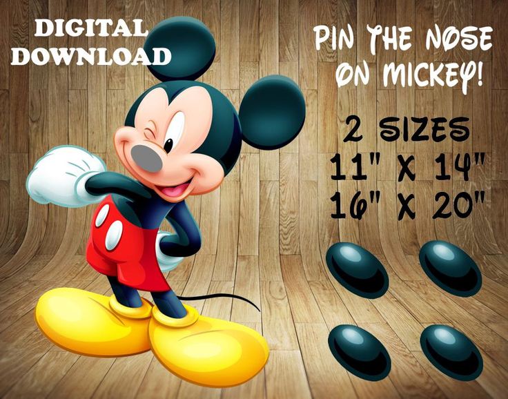 the mickey mouse is standing in front of some black and white balls with numbers on them