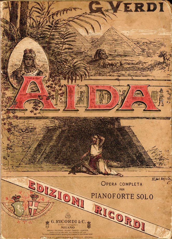 an old book with the title aida written in red and black on it's cover