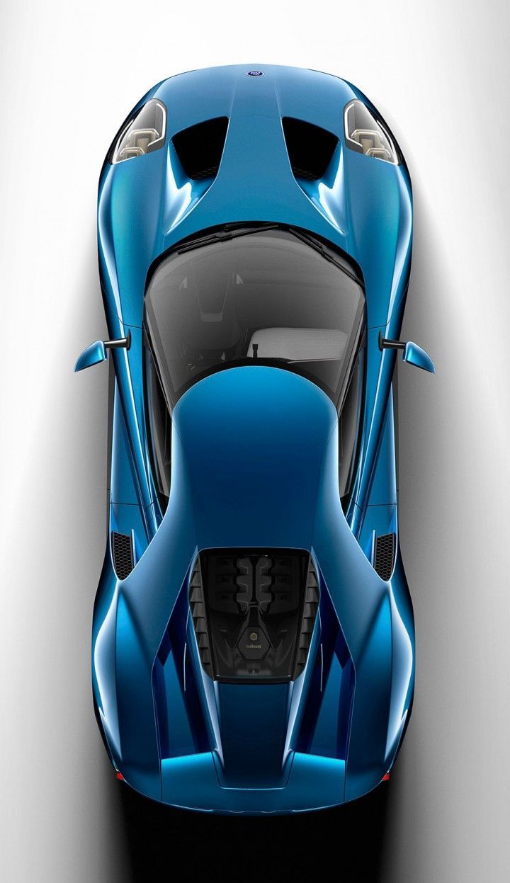 a blue sports car is shown from above