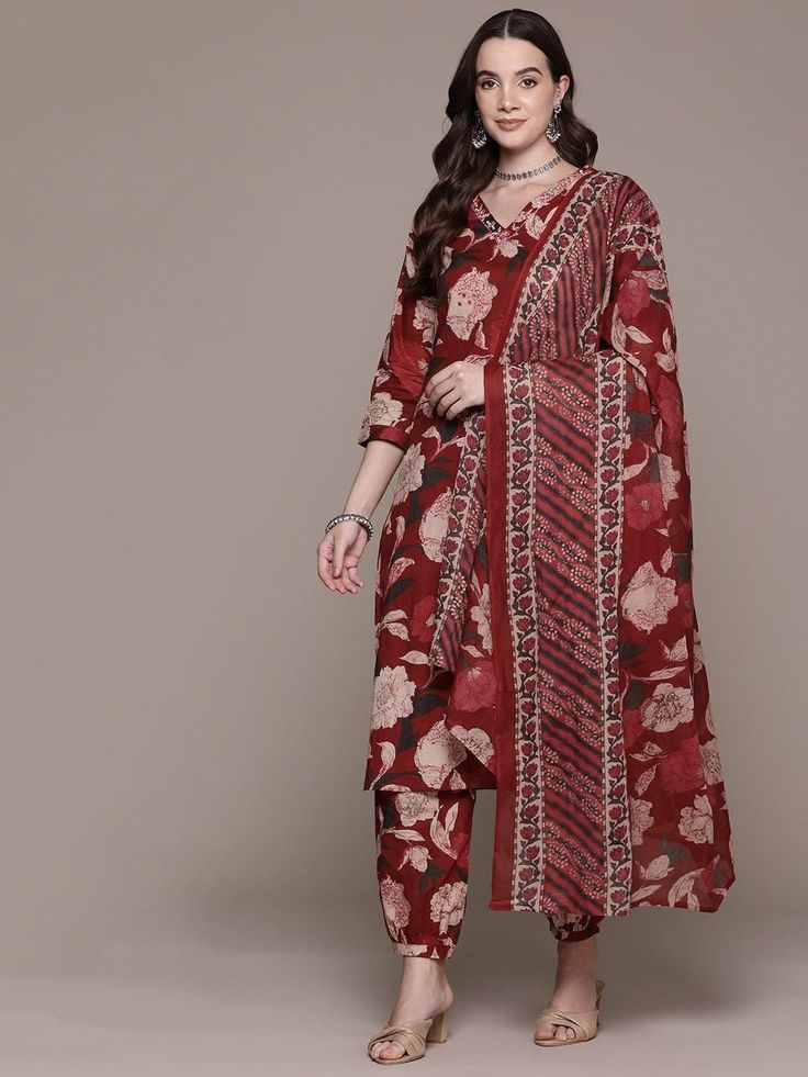 Floral Printed Thread Work Pure Cotton Kurta with Salwar & Dupatta PRODUCT DETAILS  Maroon printed Kurta with Salwar with dupatta Kurta design: Floral printed Straight shape Regular style V-neck, three-quarter regular sleeves Thread work detail Calf length with straight hem Pure cotton machine weave fabric Salwar design: Printed Salwar Elasticated waistband Drawstring closure Size & Fit Size worn by the model: 38 Chest: 32" Waist: 25'' Hips: 37'' Height: 5'8" Dupatta length: 2.25mtrDupatta width Red Floral Print Unstitched Kurta, Red Floral Print Straight Kurta Set, Red Floral Print Palazzo Set With Straight Kurta, Traditional Floral Print Dupatta For Navratri, Semi-stitched Chanderi Palazzo Set With Floral Print, Designer Wear Dupatta With Block Print, Georgette Dupatta With Kalamkari Print In Traditional Drape, Navratri Sets With Printed Border And Straight Kurta, Festive Georgette Kalamkari Dupatta