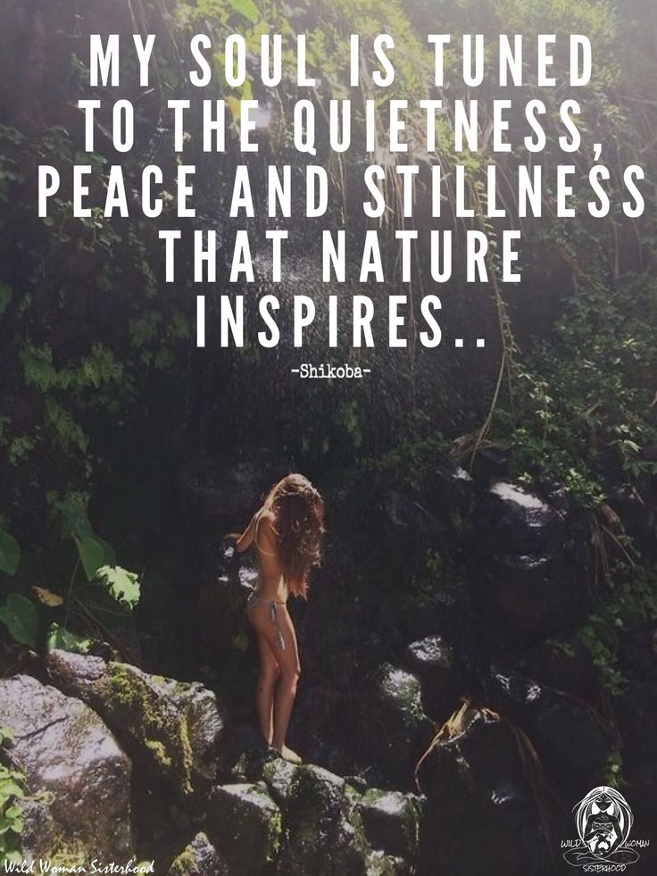 a woman standing on top of a rock in the forest with a quote above her