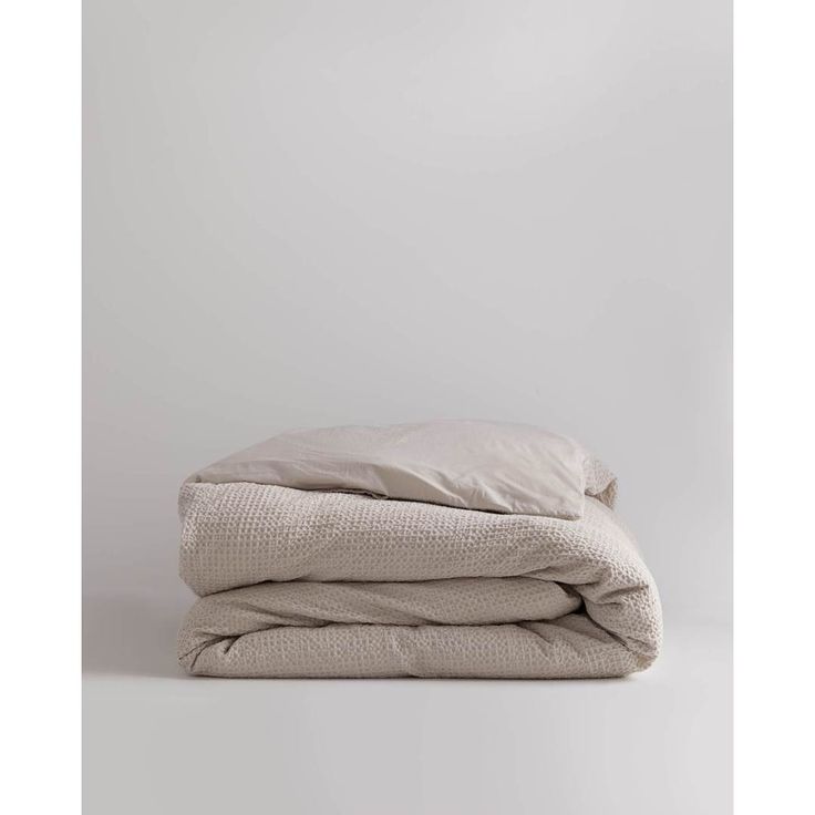 two blankets folded on top of each other