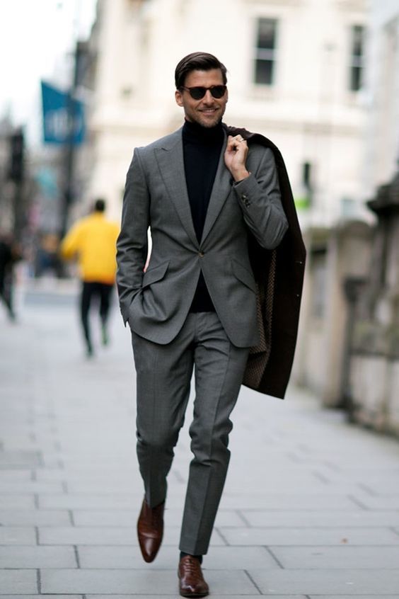 — Black Turtleneck  — Grey Suit  — Black Overcoat  — Brown Leather Oxford Shoes Winter Fashion Outfits Dressy, Engagement Party Attire, A Man In A Suit, Black Overcoat, Man In A Suit, Grey Suit, Men’s Suits, Gray Suit, Mens Fashion Suits