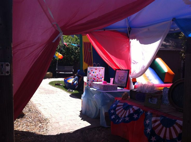 an outside tent with various items on it