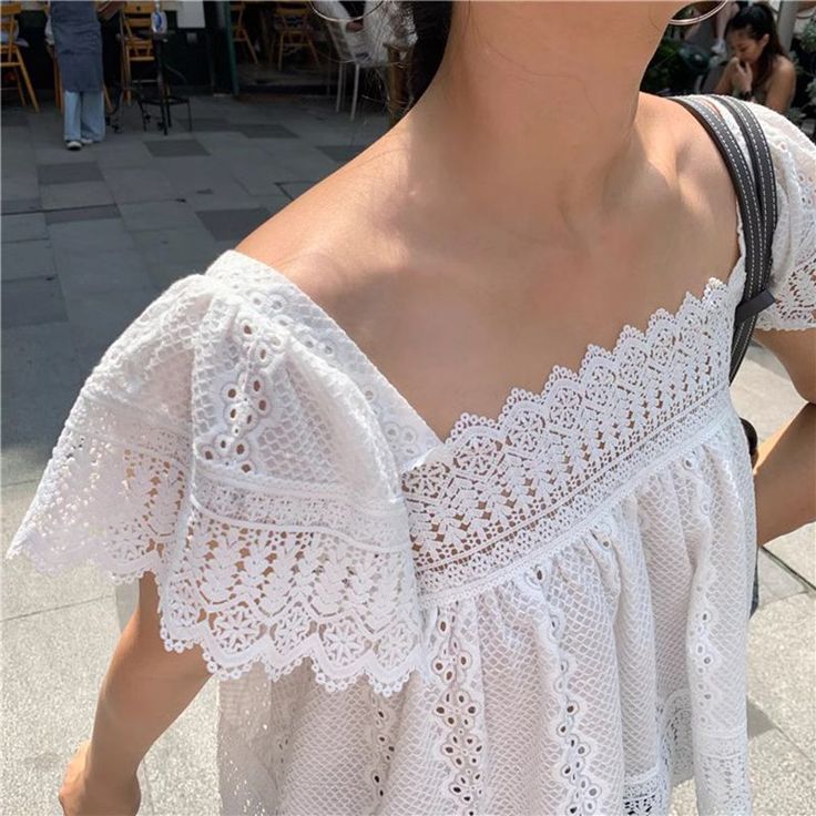 Details:    15% OFF New Seaon Sale, 1-% OFF 1st Order, Free Shipping $60. Free Exchange & Easy Returns.       This   eyelet crochet lace blouse      features cotton fabric, shirred adjustable tummy, slimming     u neck,     cropped and ruffle at the hem.     The     cropped ruffle tank     top     is one of the most popular     basic     summer essentials.    Material: 95% Cotton     &5% Spandex     Color: White         Design: Cotton, Eyelet, Crop Top, Scalloped edge,     Hem, Sleeveless,     Peplum, Tank,     Ruffles     & Casual.     Weight: approx     0.15kg     Machine     Wash     Cold. Ruffle Hem Blouse, Crochet Lace Blouse, Sleeveless Peplum Top, Ruffle Tank Top, Lace Peplum, Hem Blouse, Peplum Hem, Blouse Tops, U Neck