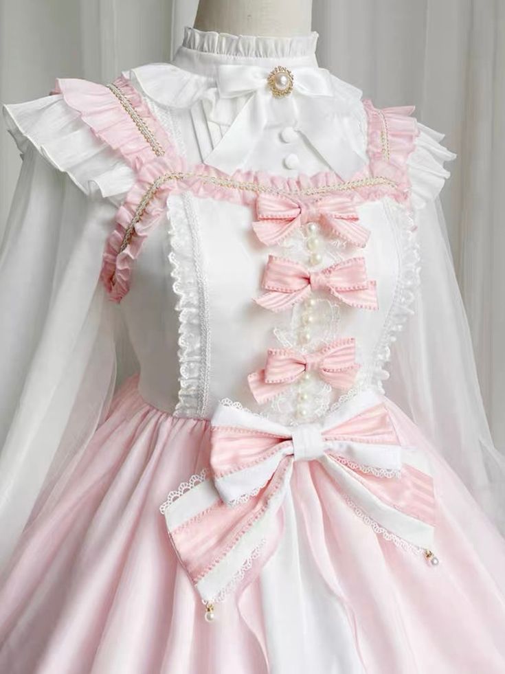 Pink Bow Lolita Sweet Dress Elevate your style with the Pink Bow Lolita Sweet Dress. Featuring a delicate pink bow, this dress exudes elegance and sweetness. Made from high-quality materials, it offers both comfort and style. Perfect for any occasion, it is sure to make a statement and turn heads. Size Chart (cm) ? Bust Shoulder Width Dress Length Top Length? L 96 37 106 57 XL 102 38 107 58 2XL 108 39 108 59 3XL 114 40 109 60 4XL 120 41 110 61 White Sleeveless Kawaii Dress, Kawaii Summer Dress With Lace Trim, Sweet Sleeveless Wedding Dress, Pink Party Dress With Doll Collar, Pink Doll Collar Dress For Spring, Cute White Dresses With Bow Print, Pink Bow Print Summer Dress, Pink Bow Print Dress For Summer, Pink Spring Dress With Bow Print