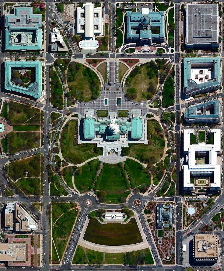 an aerial view of a city with lots of streets and buildings in it's center