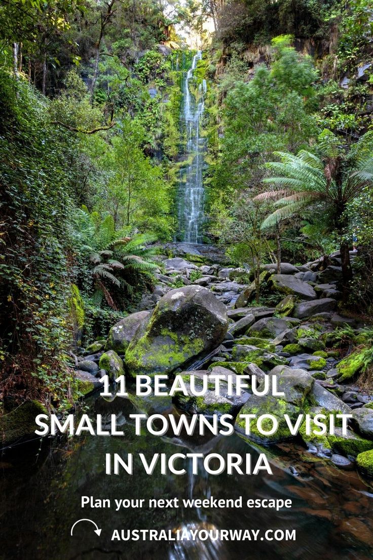 a small waterfall in victoria, australia with text overlay that reads 11 beautiful small towns to visit in victoria