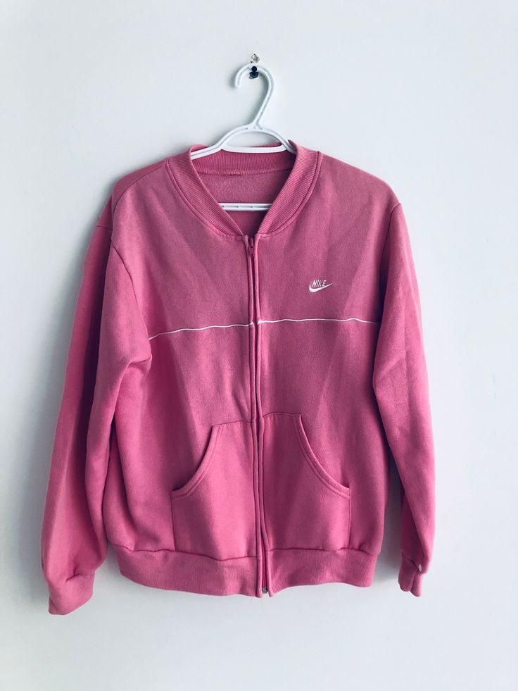 pink vintage nike sweatshirt.  Size:  pit to pit: 22" neck to bottom: 25" collar to cuff: 29" Pink Sweatshirt With Ribbed Collar For Spring, Pink Fleece Sweats For Sportswear, Pink Fleece Sweats Sportswear, Pink Fleece Sweats In Athleisure Style, Pink Fleece Sweats For Athleisure, Pink Sports Hoodie With Ribbed Cuffs, Pink Crew Neck Sweatshirt With Ribbed Collar, Pink Cotton Sweatshirt With Ribbed Collar, Pink Ribbed Collar Crew Neck Sweatshirt