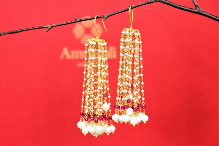 Buy stunning gold plated pearl tassel earrings online in USA. Look beautiful in Indian jewelry, gold plated jewelry , silver jewelry, gold plated earrings, wedding jewellery from Pure Elegance Indian fashion store in USA.-full view Elegant Tassel Earrings For Festive Occasions, Festive Chandelier Earrings With Latkans For Reception, Festive Latkans Chandelier Earrings For Reception, Gold Pearl Drop Tassel Earrings For Wedding, Traditional Tassel Dangle Earrings For Festivals, Festive Temple Jewelry Pearl Chain Earrings, Festive Fusion Pearl Earrings With Latkans, Elegant Chandelier Earrings With Latkans For Reception, Elegant Wedding Tassel Earrings With Latkans