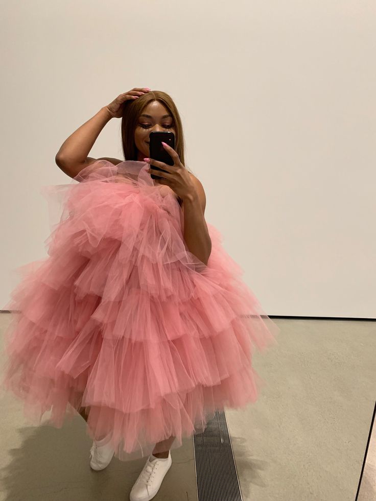 Ruffled tulle dress with elastic strapless band Strapless Midi Dress With Ruffled Skirt, Wedding Mini Dress With Tiered Ruffles, Pink Voluminous Evening Dress, Wedding Tiered Ruffle Mini Dress, Chic Bubble Dress With Ruffles For Cocktail, Chic Strapless Tulle Dress For Wedding, Chic Strapless Tulle Wedding Dress, Chic Tulle Strapless Wedding Dress, One-shoulder Ruffled Dress For Gala