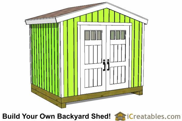 a green shed with the words build your own backyard shed