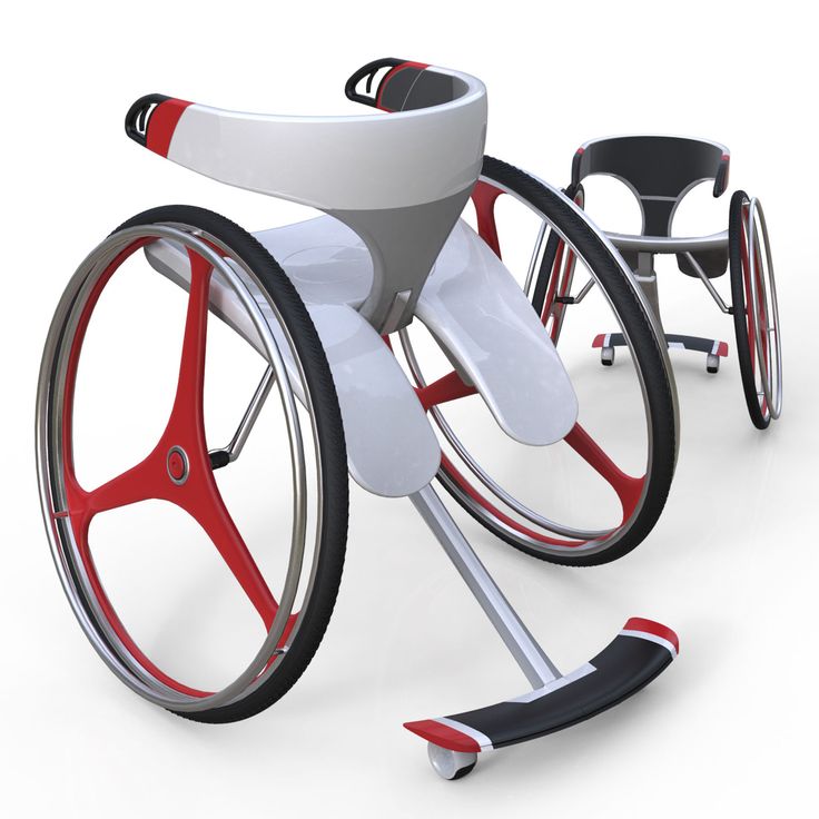 a white and red wheelchair with wheels on it