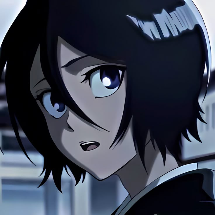 an anime character with black hair and blue eyes looking at the camera while standing in front of a building