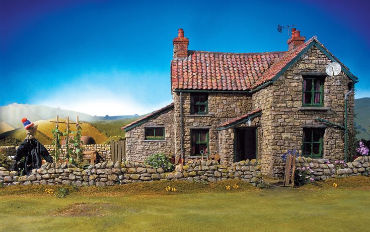 a painting of a stone house in the country