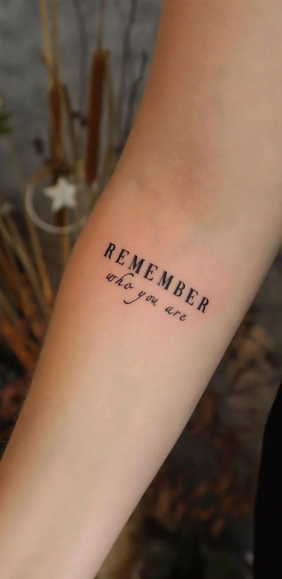 a person with a tattoo on their arm that says, remember when you were born