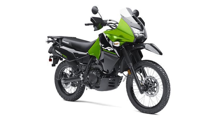 a green and black motorcycle on a white background