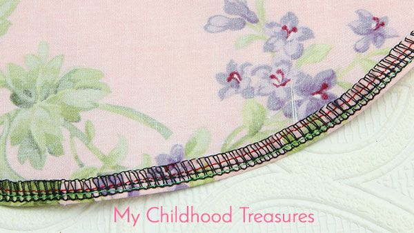 a close up of a piece of fabric with flowers on it and the words, my childhood treasures