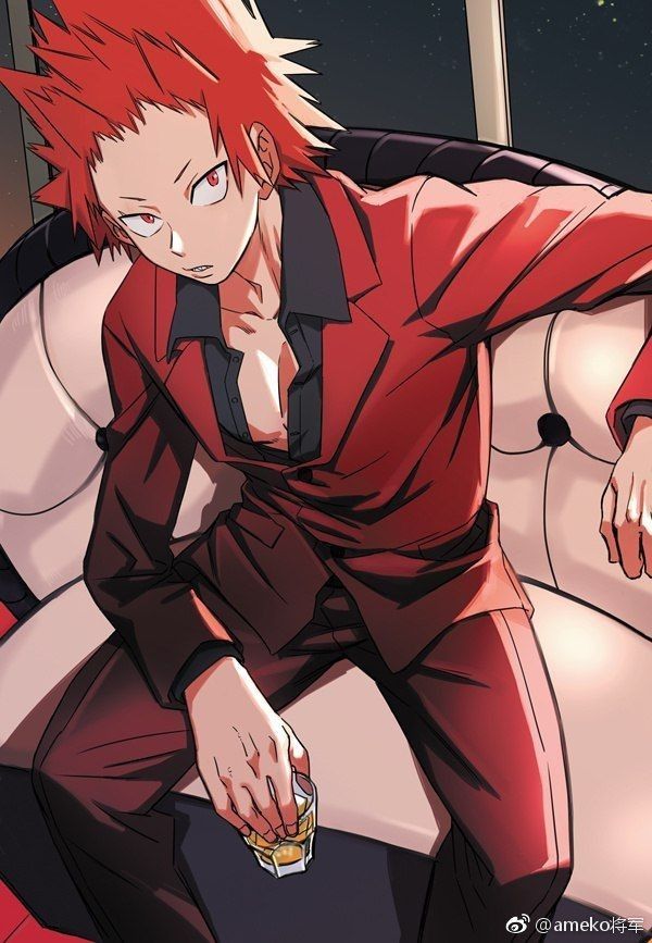 an anime character with red hair sitting on a couch