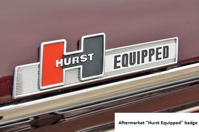 an emblem on the front of a car that says, hurst equiped