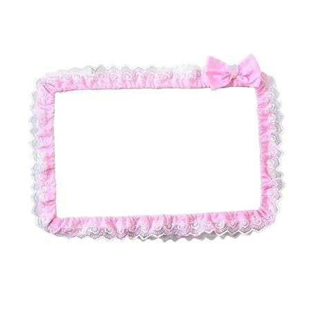 a pink and white photo frame with a bow on the top, in front of a white background