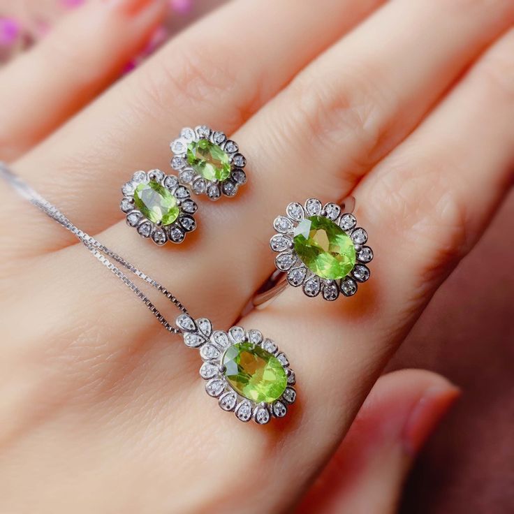 "❤ Peridot Jewelry Information ❀ Gemstone Shape: Oval ❀ Natural Earrings Main Stone Size: 4*6mm ❀ Natural Ring and Pendant Main Stone Size: 6*8mm ❀ Gemstone Type: Natural Peridot ❀ Other stones : dainty cz diamond (shining zircon) ❀ Metal type: 925 Sterling Silver ❀ Metal type: 18K Rose Gold Plated. ❀ Setting Type: 4 Prongs setting ❤ More jewelry you like, please click the following link: More ring to choose as link : https://etsy.me/2Clb6Kh More necklace to choose as link: https://etsy.me/2BrIG Green Fine Jewelry Sets For Anniversary, Green Gemstone Jewelry Sets In Sterling Silver, Peridot Jewelry With Gemstone Accents, Sterling Silver Green Gemstone Jewelry Sets, Lime Green Peridot Jewelry For Wedding, Elegant Peridot Gemstones For Gifts, Fine Jewelry With Peridot Gemstone Accents, Lime Green Gemstone Jewelry For Wedding, Luxury Peridot Jewelry With Stones