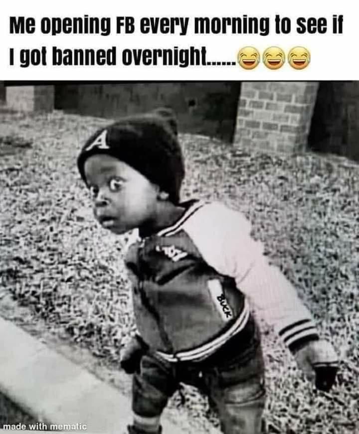 a little boy standing on top of a sidewalk in front of a brick wall with the caption me opening fb every morning to see if i got banned overnight