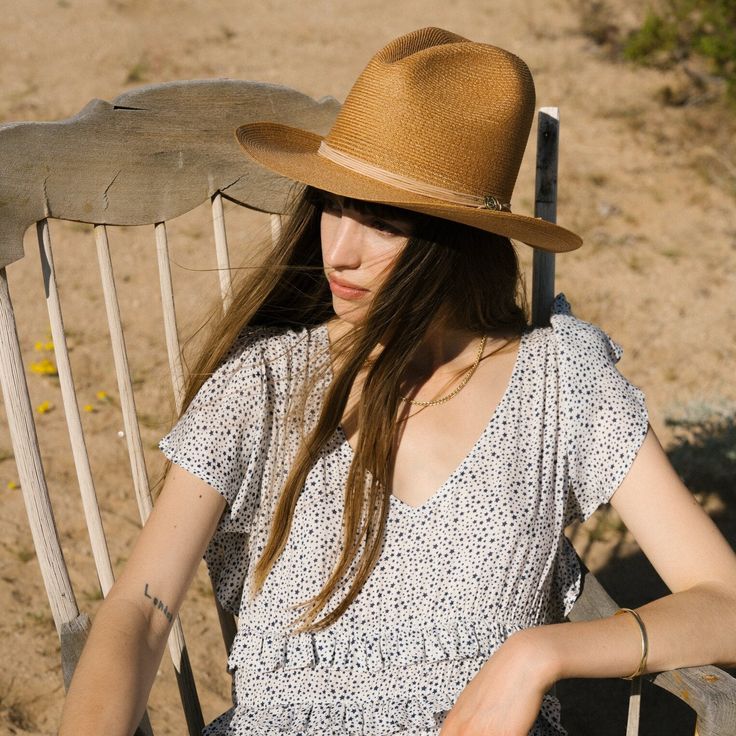 The Magic Eye Straw Hat is crafted from high-quality 100% shantung straw. It has a 3” brim and a 4” x 5 1/2” sloped Gus crown—a classic statement making western style. It’s complemented by a silk cord hat band and Stetson hat. A genuine leather sweatband for a time-tested fit and all-day comfort. Handmade in the U.S.A. with the finest construction and materials, our straw hats are made to stand the test of time. 4” x 5 1/2” Gus Crown 3” Brim Silk Cord Hat Band Stetson Hat Pin Genuine Leather Swe Classic Straw Hat For Ranch In Summer, Classic Summer Straw Hat For Ranch, Classic Summer Ranch Straw Hat, Classic Straw Hat For Spring Ranch, Classic Summer Hat For Rodeo, Classic Straw Hat For Ranch In Spring, Western Straw Brimmed Fedora, Classic Sun Hat For Ranch In Summer, Natural Fedora For Country Events With Short Brim