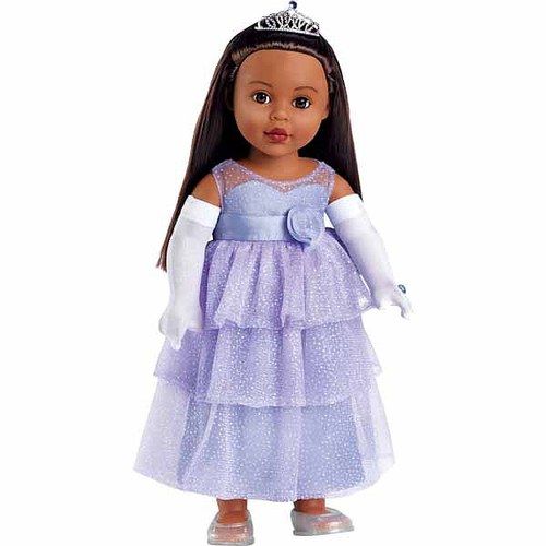 a doll dressed in a purple dress and tiara, standing on a white background