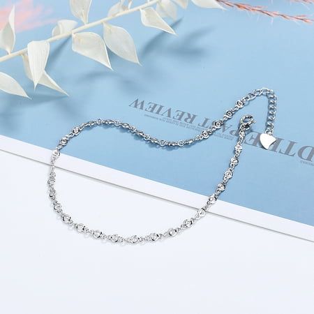 This chic and trendy anklet is the perfect addition to any jewelry collection for the fashion-forward, modern adult. Adorned with sparkling crystals from Swarovski, it radiates an elegant and sophisticated look. The Swarovski crystals are expertly created and set in a rhodium-plated brass for a luxurious finish. The anklet is lead- and nickel-free, making it hypoallergenic and safe for those with sensitive skin. The anklet features a high-polish finish and is designed with a cable chain for dura Anklets Boho, Sparkling Crystal, Active Wear Leggings, Trendy Jewelry, Chic Boutique, Spring Rings, Sophisticated Look, Cable Chain, Girls Shopping