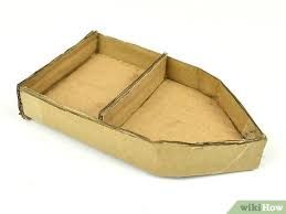 an empty cardboard boat on a white background