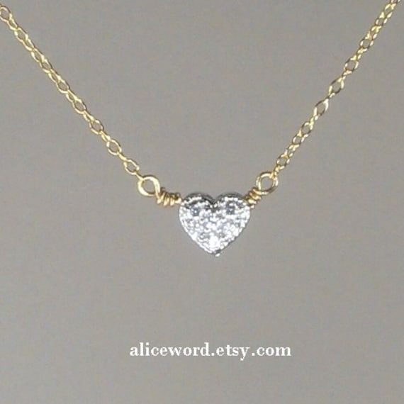 "This precious little heart speaks volumes about the tremendous love that you have in your heart. The 3/8\" pendant is made of tiny cz stones set within pave heart that's been heavily plated with white gold to showcase and enhance their sparkle. The necklace's chain is available in either sterling silver or 14k gold fill, and both versions feature the same white gold heart set with sparkling pave czs. What a sweet reminder of your love. The chain will be custom sized just for you (or a loved one Mystic Jewelry, Diamond Heart Necklace, Card Necklace, Silver Gift Box, Heart Necklace Diamond, Heart Choker, Zodiac Necklace, Gold Heart Necklace, Necklace Simple