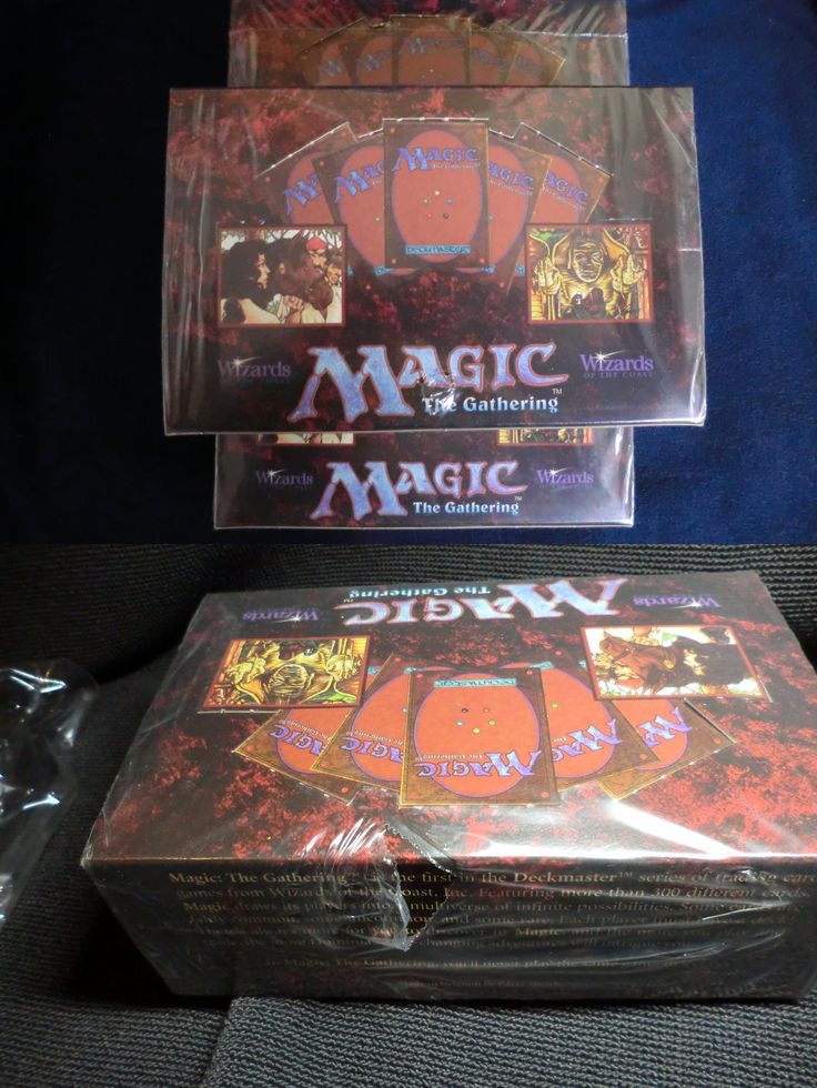 two cds sitting on top of each other in plastic cases, with the covers pulled down