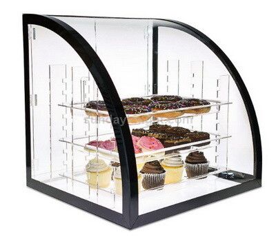 a display case filled with lots of different types of donuts and cupcakes