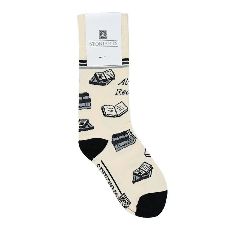 Go for it. Kick your feet up on the ottoman and crack open a favorite story: it's time to read. You won't get cold feet with our Always Reading Socks, covered in a playful print of tiny books. These mid-length crew socks fit most adult sizes and their neutral color allows them to be worn with just about anything you read in. Product details: Made from 75% cotton, 22% nylon, 3% spandex for stretch Mid-calf length crew socks Versatile neutral colors One size fits most: Men 7-12, Women 6-11 Designe Reading Socks, Casual Socks, Socks And Hosiery, Mid Length, Mid Calf, Portland, Hosiery, Crew Socks, Neutral Colors