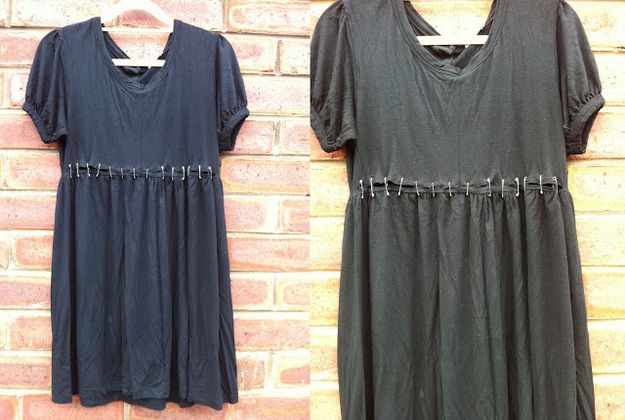 two dresses hanging on a brick wall next to each other in front of a brick wall