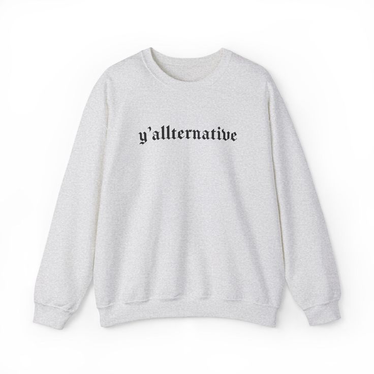 🖤 Blend Southern Charm with Goth Aesthetics in Goth Cloth's 'Yallternative' Long Sleeve Sweatshirt 🖤 Introducing Goth Cloth's 'Yallternative' Long Sleeve Crew Neck Sweatshirt – where the allure of the goth meets the charisma of the South. For those who love to stand out with a unique blend of styles, this sweatshirt is a must-have. Ideal for chilly evenings or cozy days in, it's a statement piece that's as comfortable as it is striking. Key Features: Standout Gothic Font: 'Yallternative' inscribed in a mesmerizing gothic font, perfect for the unconventional. Supreme Comfort: Crafted from 100% Airlume combed and ringspun cotton for a soft, inviting feel. Fit for All: Unisex retail fit, catering to every body type. Ladies, consider a size down for a more fitted look. Durable and Cozy: Ribb Letter Print Sweater For Fall Streetwear, Letter Print Sweater For Streetwear In Fall, Fall Grunge Streetwear Sweatshirt, Trendy Fall Sweater With Screen Print, Grunge Long Sleeve Sweatshirt For Fall, Grunge Style Text Print Tops For Fall, Fall Grunge Long Sleeve Sweatshirt, Trendy Fall Sweatshirt With Screen Print, Alternative Crew Neck Fall Sweater