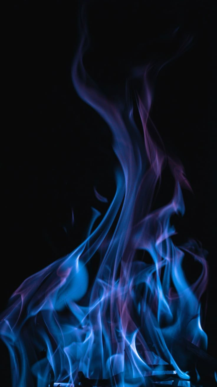 blue and purple flames on a black background