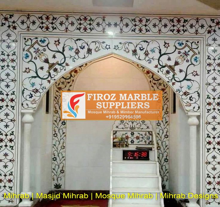 the entrance to froz marbel supplies is decorated with white tiles and floral designs