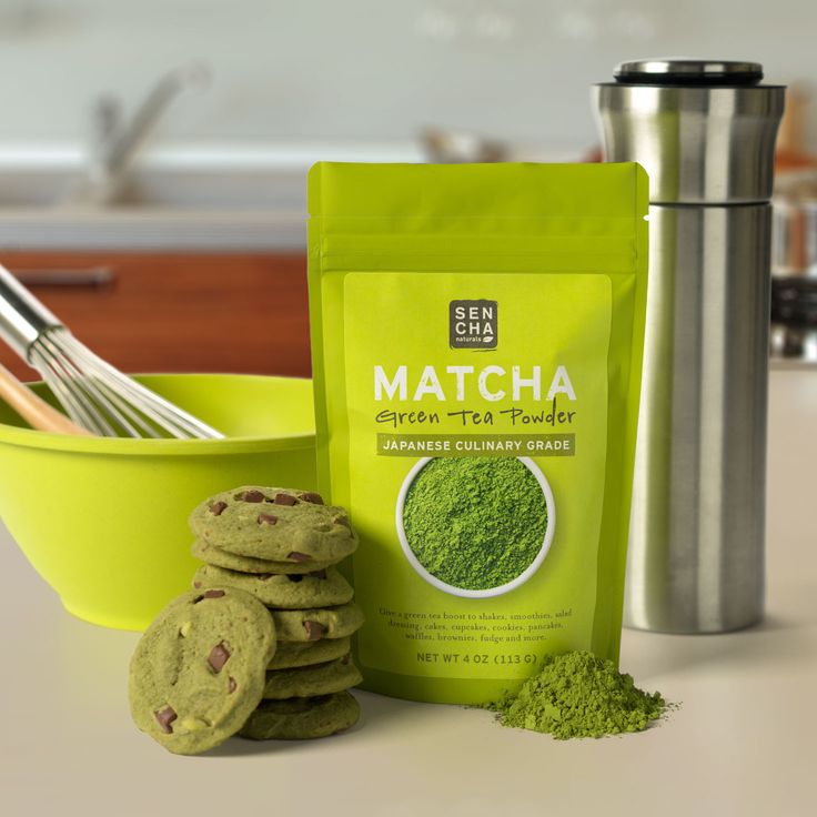 green tea powder and cookies on a counter