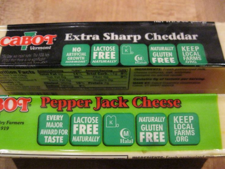 two boxes of pepper jack cheese sitting on top of a table