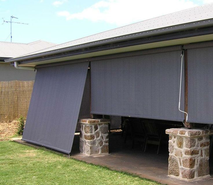 an image of a house that has awnings on the roof and side walls