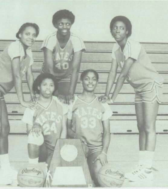 an old black and white photo of basketball players