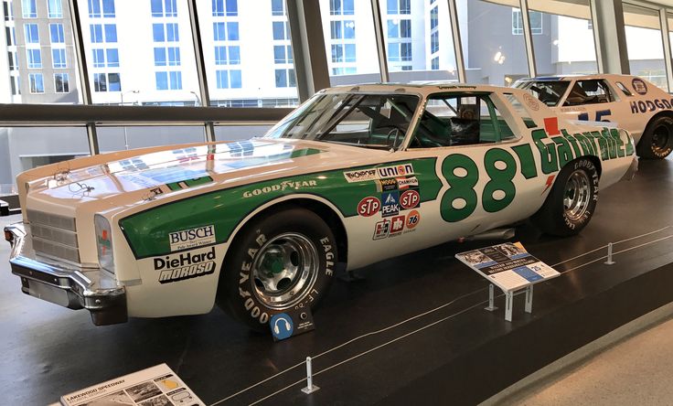 an old race car on display in a museum