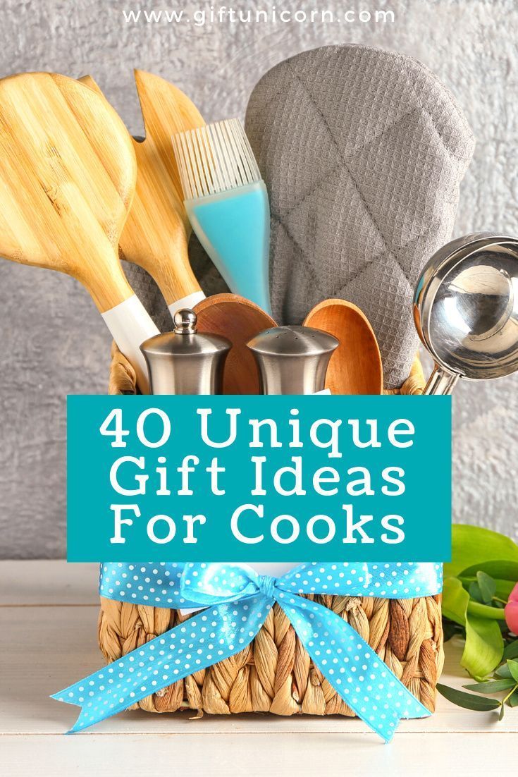 a basket filled with kitchen utensils on top of a table