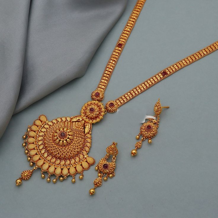 Discover the allure of Handmade Gold Jewelry at https://morvijewels.etsy.com/   Get a dazzling 25% off on all our 22k and 18k gold pieces. Don't miss out on this limited-time offer. Shop now and embrace the radiance of gold! Beautiful yellow gold handmade necklace earrings set Metal - Yellow Gold Gold Purity- 22 karat yellow Gold Set Weight - 57 grams approx Length - Necklace 12.5 inches, Earrings 6 cm approx Width - Necklace 7.1 cm, Earrings 1.5 cm approx Only earrings weight - 10.80 grams approx The earrings comes with normal backs, if you want real gold screw please contact                                                  Click to see more https://www.etsy.com/in-en/shop/morvijewels?ref=seller-platform-mcnav minimalist, eternity, infinity, karma, cabochon, statement, chunky, ethnic, bij Gold Long Necklace Set, Gold Handmade Necklace, Gold Jewelry Wedding, Handmade Gold Necklace, Indian Gold Jewelry, Long Necklace Set, Recycled Necklaces, Gold Necklace Indian, Necklace Set Indian