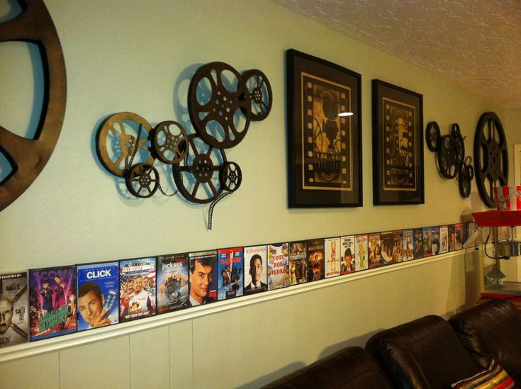 a row of movies hanging on the wall