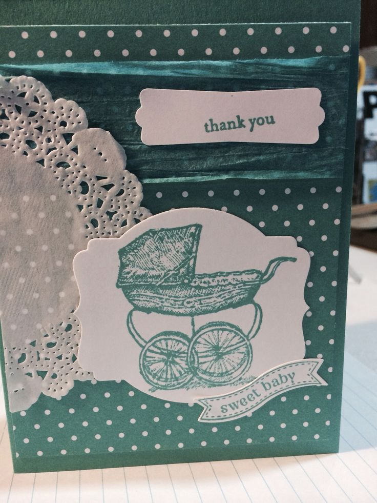 a thank you card with a baby stroller on it and doily around the edges