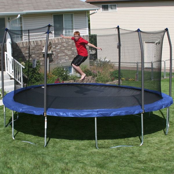 a young boy jumping on a trampoline in the back yard for $ 250