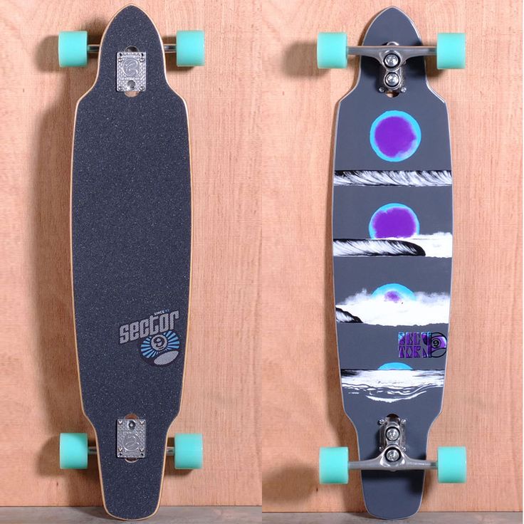 two skateboards mounted to the side of a wooden wall, one with blue wheels